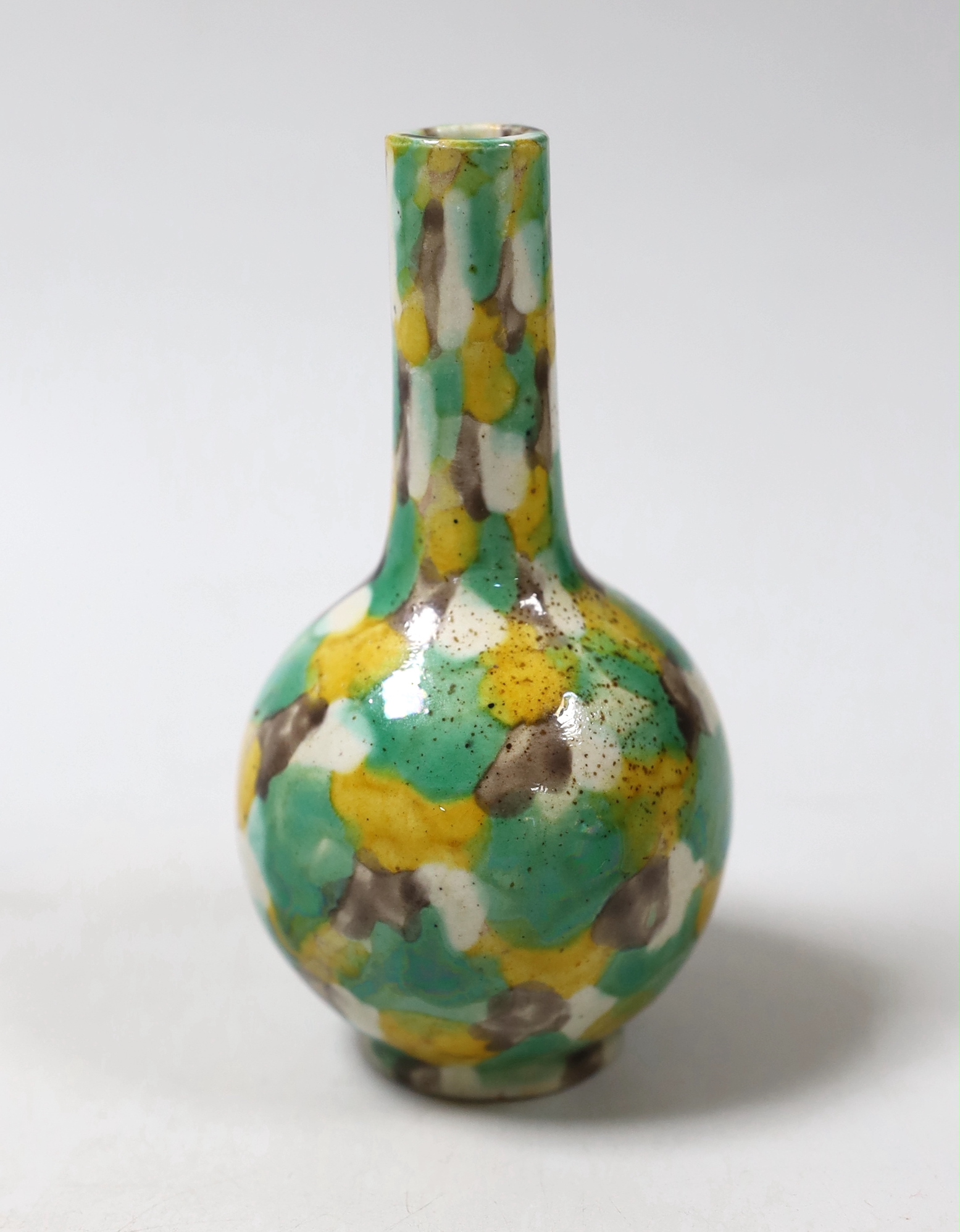 A small Chinese polychrome bottle vase, 13.5cm high